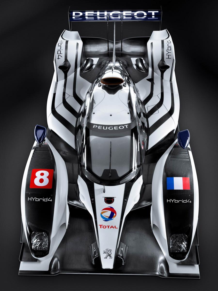  Peugeot 908 HYbrid4 2011 года  (фото 8 из 12)